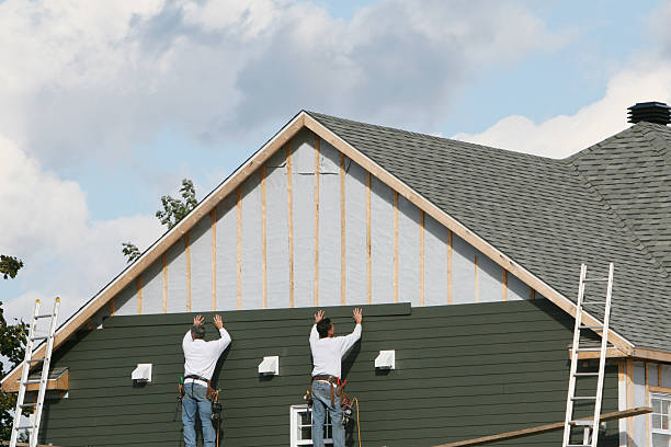 Professional Siding technician working in Bethel, MN